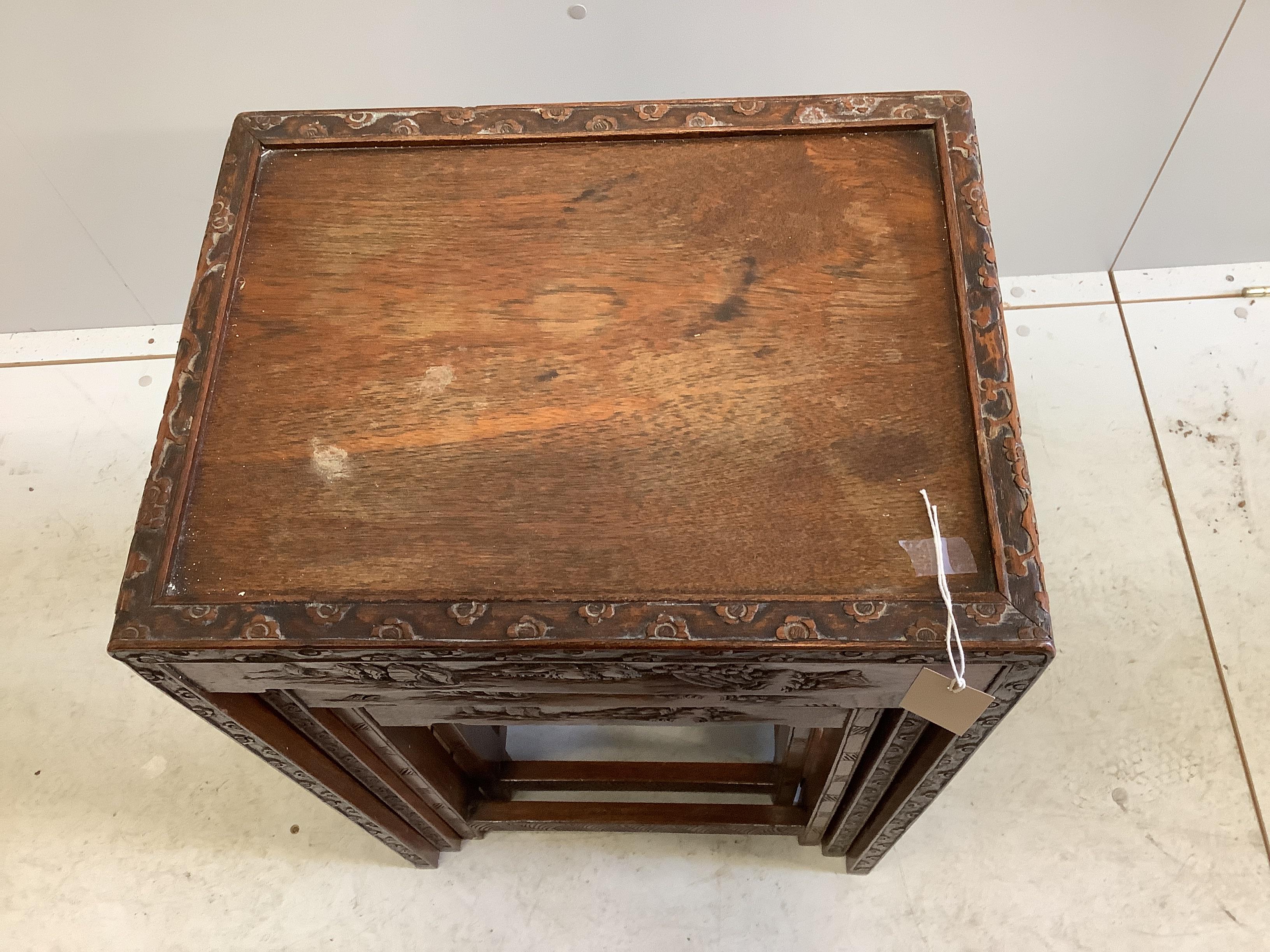 A Chinese carved wood quartetto of rectangular tea tables, width 46cm, depth 35cm, height 69cm